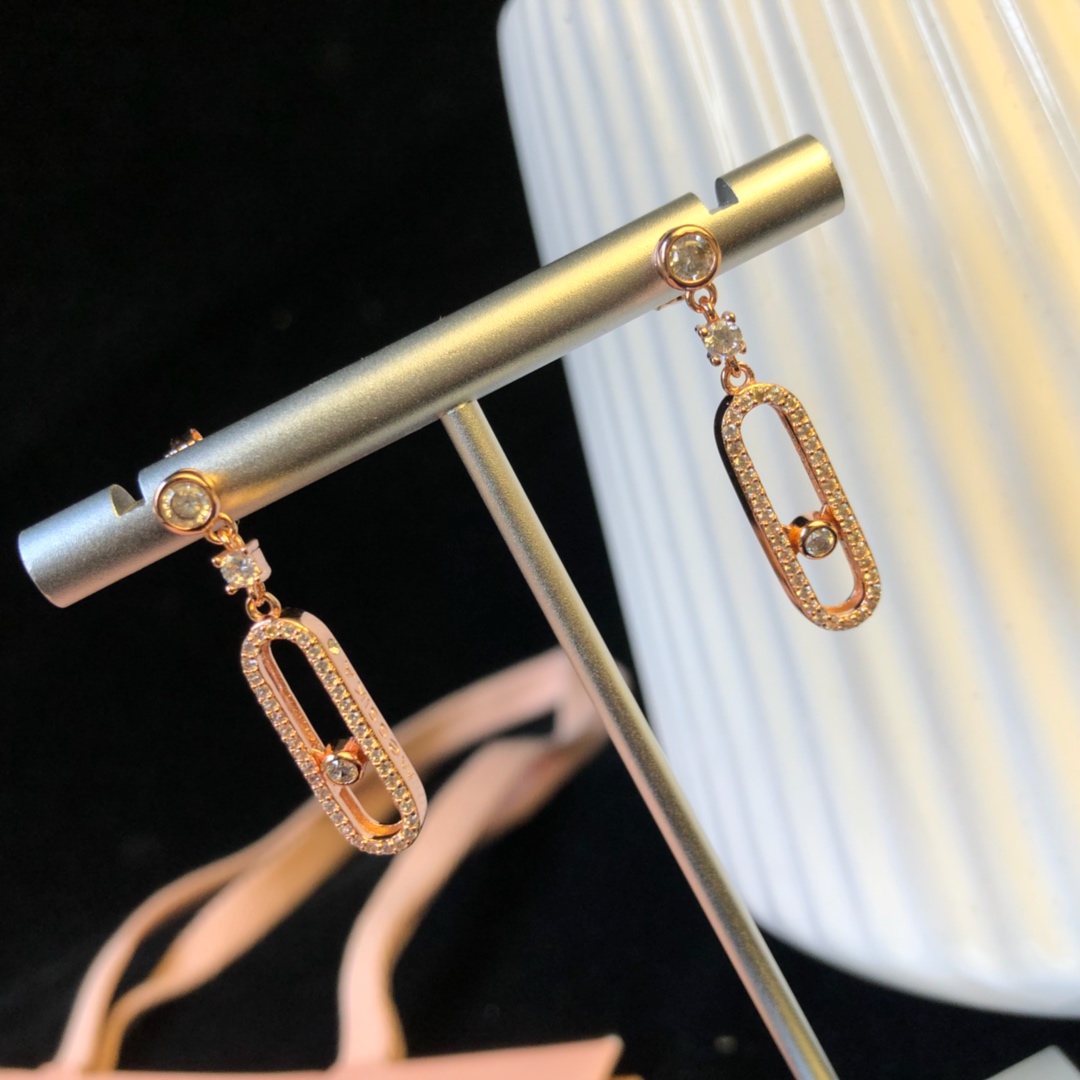 Messika Move Uno earrings Available in 18k rose gold 18k yellow gold and 18k white gold all set with clear round brilliant diamonds 2 5cm drop length