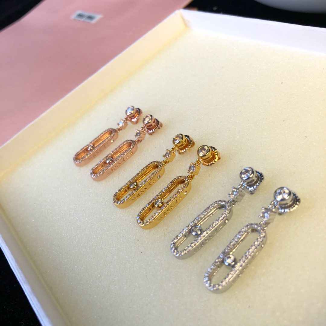 Messika Move Uno earrings Available in 18k rose gold 18k yellow gold and 18k white gold all set with clear round brilliant diamonds 2 5cm drop length