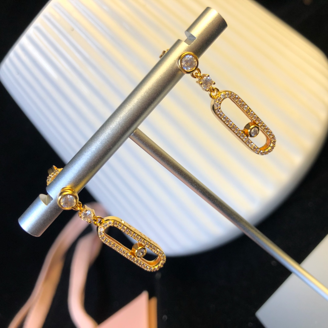 Messika Move Uno earrings Available in 18k rose gold 18k yellow gold and 18k white gold all set with clear round brilliant diamonds 2 5cm drop length