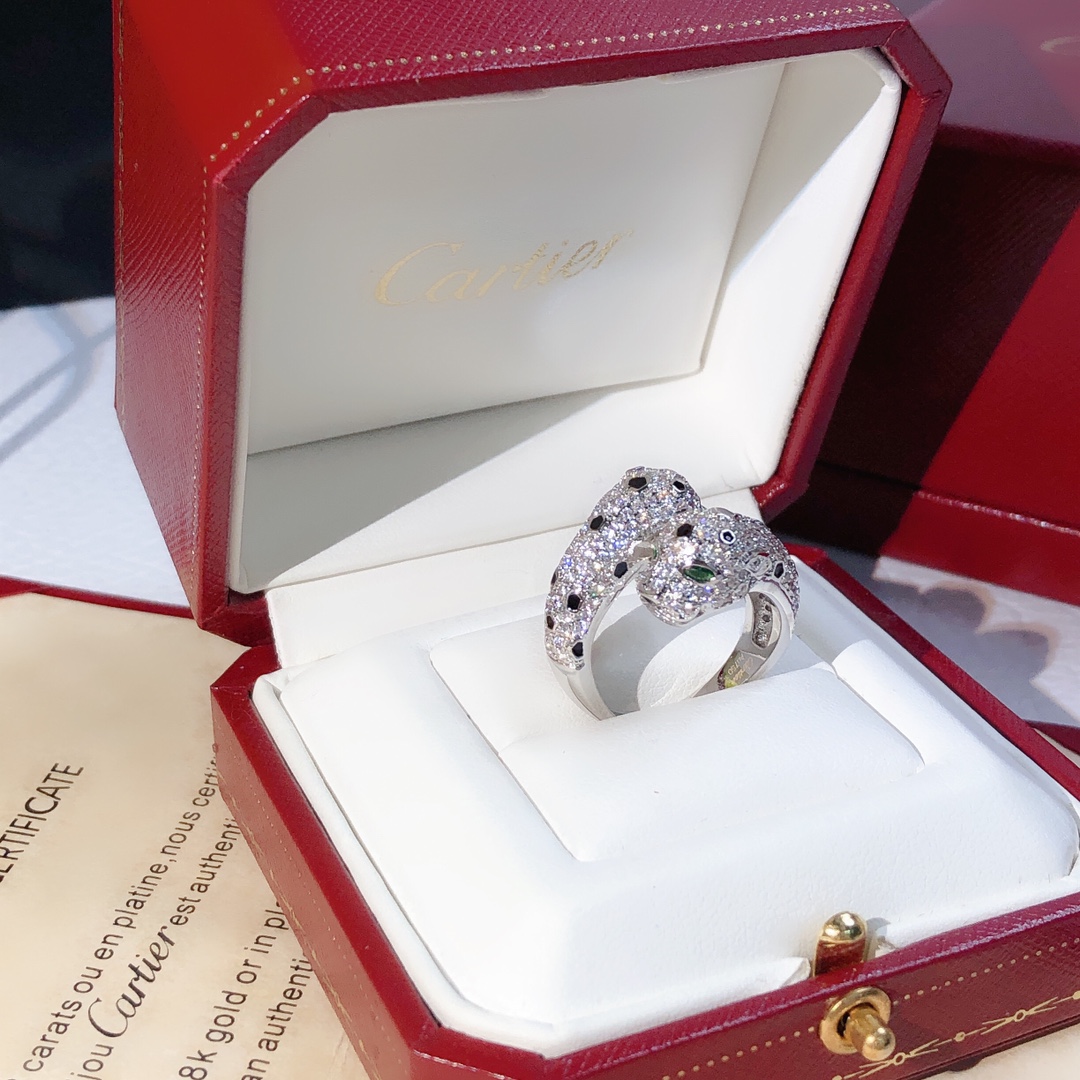 Cartier Panthere de Cartier ring 18K white gold paved diamonds black onyx spots tsavorite garnet eyes 54