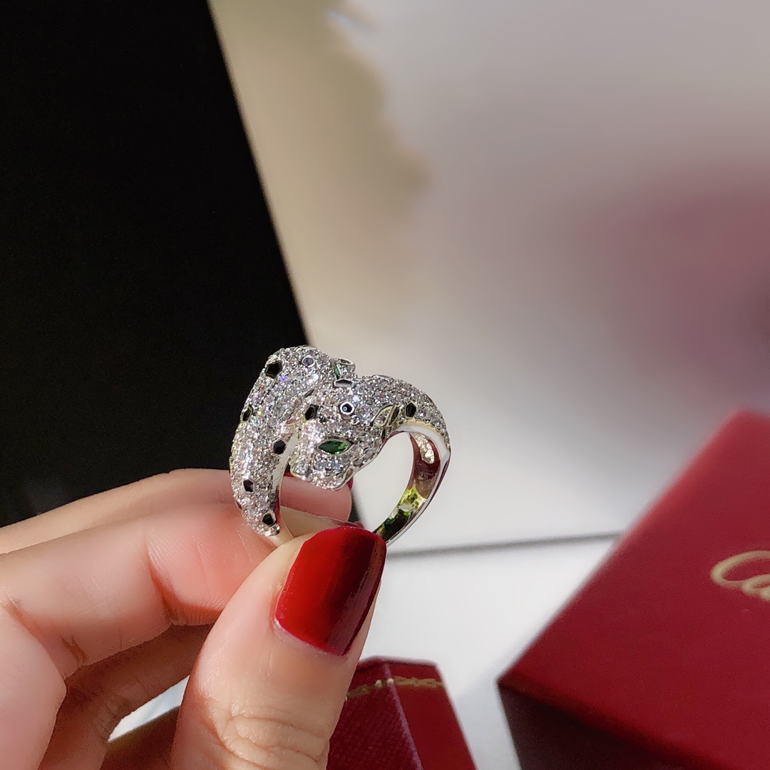 Cartier Panthere de Cartier ring 18K white gold paved diamonds black onyx spots tsavorite garnet eyes 54
