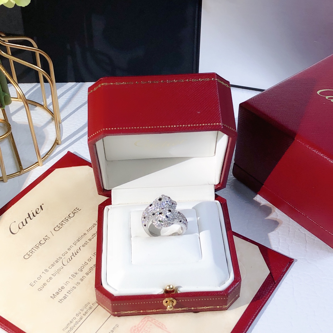 Cartier Panthere de Cartier ring 18K white gold paved diamonds black onyx spots tsavorite garnet eyes 54
