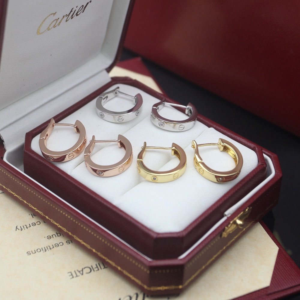 Cartier Love earrings Available in 18k rose gold 18k yellow gold and 18k white gold each set with small clear round diamonds 13mm outer hoop diameter