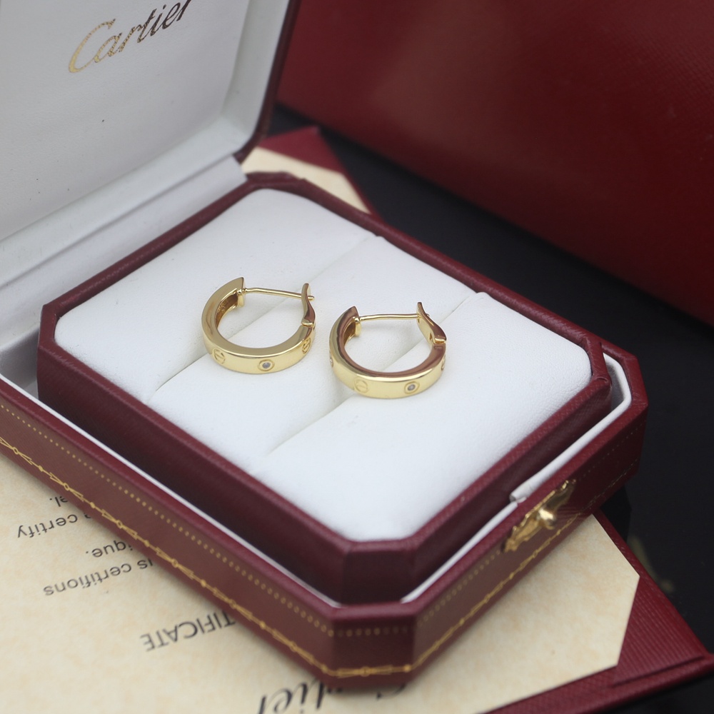 Cartier Love earrings Available in 18k rose gold 18k yellow gold and 18k white gold each set with small clear round diamonds 13mm outer hoop diameter