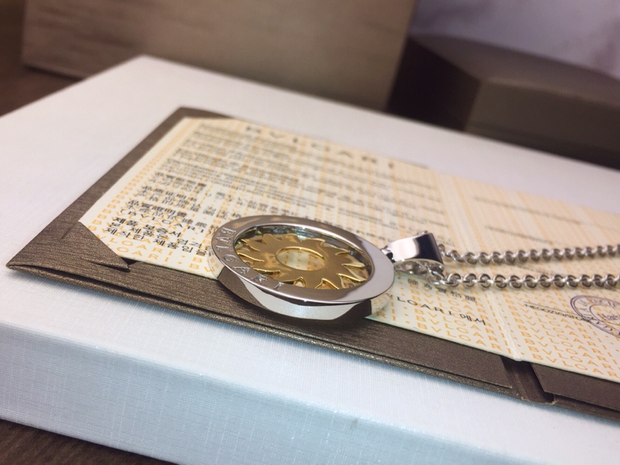 Bvlgari Tondo Sun necklace silver stainless steel yellow gold sun motif 65cm