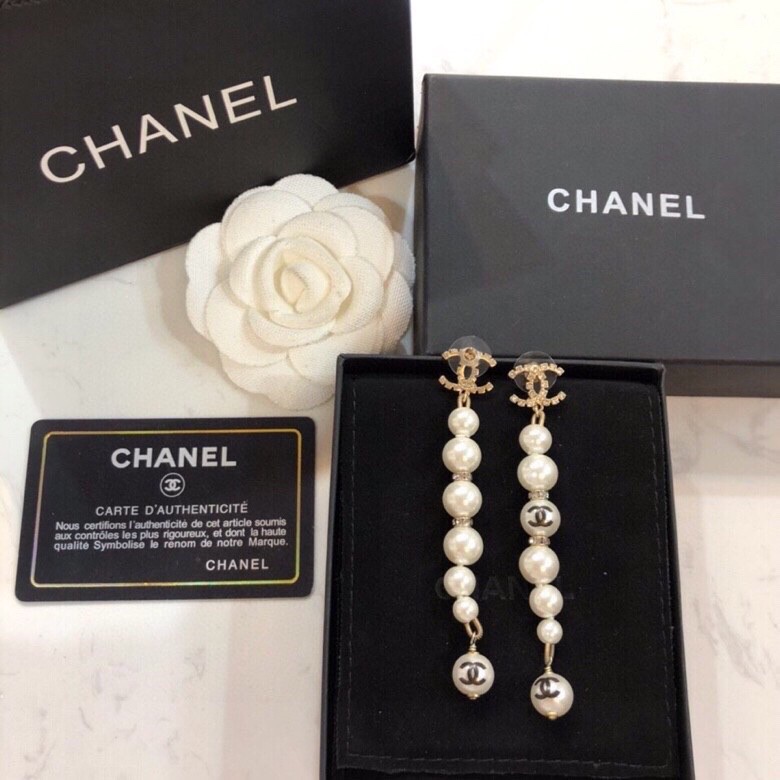 Chanel CC Logo Graduated Pearl Drop Earrings earrings Gold-tone metal white faux pearl clear crystal black enamel CC logo 6 5cm drop length