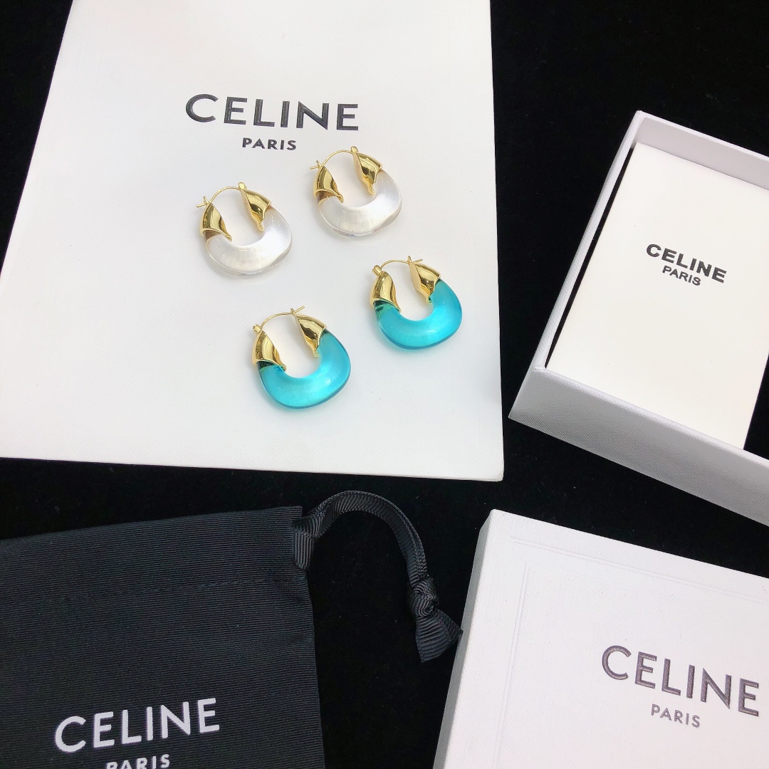 Celine Celestine earrings gold-tone metal with translucent frosted white resin 2 5cm hoop diameter