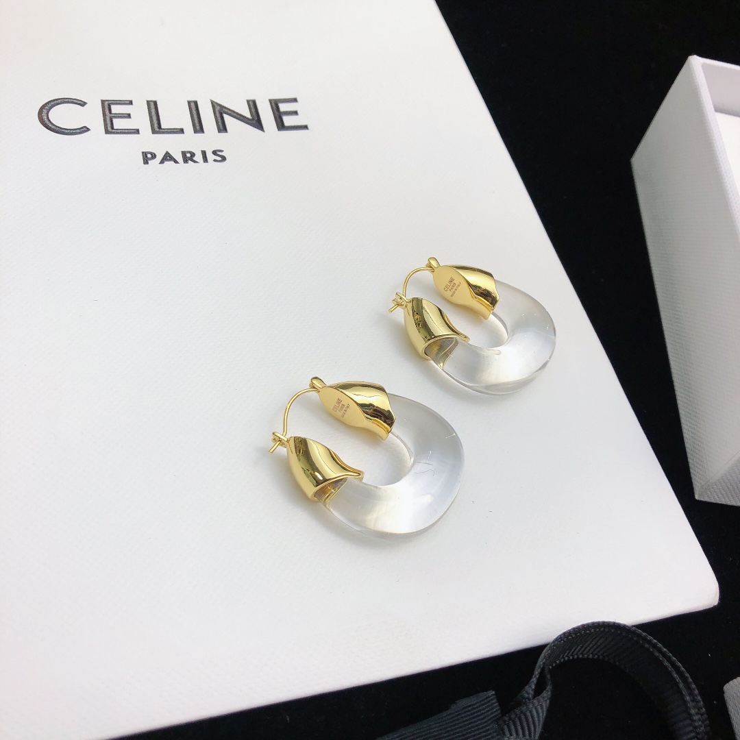 Celine Celestine earrings gold-tone metal with translucent frosted white resin 2 5cm hoop diameter
