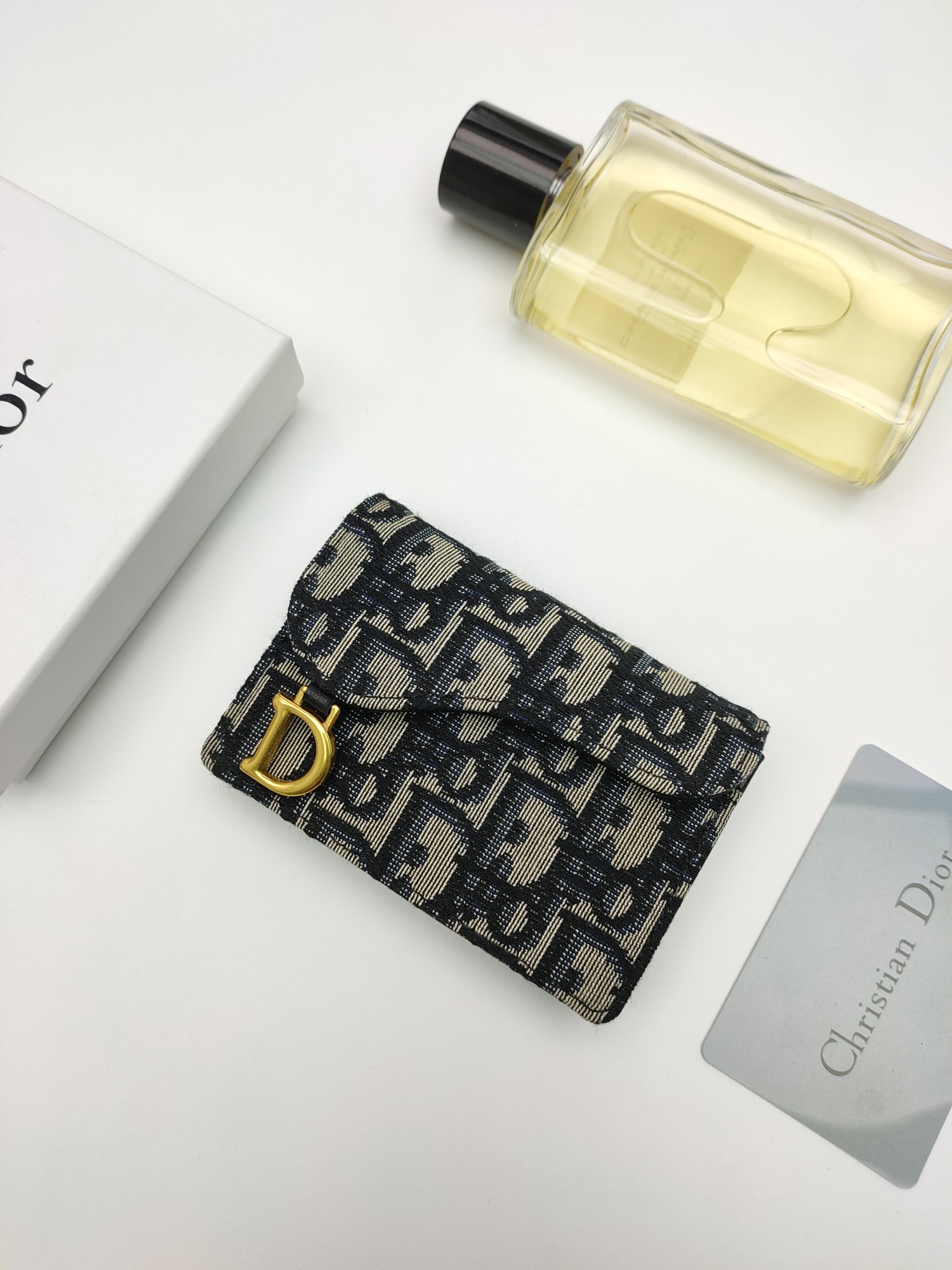Dior Dior Oblique Saddle Card Holder brooch Beige and black Dior Oblique jacquard canvas with gold-tone metal hardware black leather interior 11 7 5 2 5cm pendant