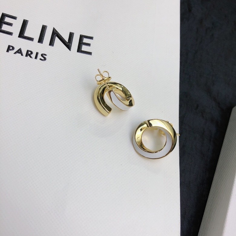 Celine Twisted Hoop Stud Earrings earrings gold-tone metal with white enamel accent 1 5cm diameter