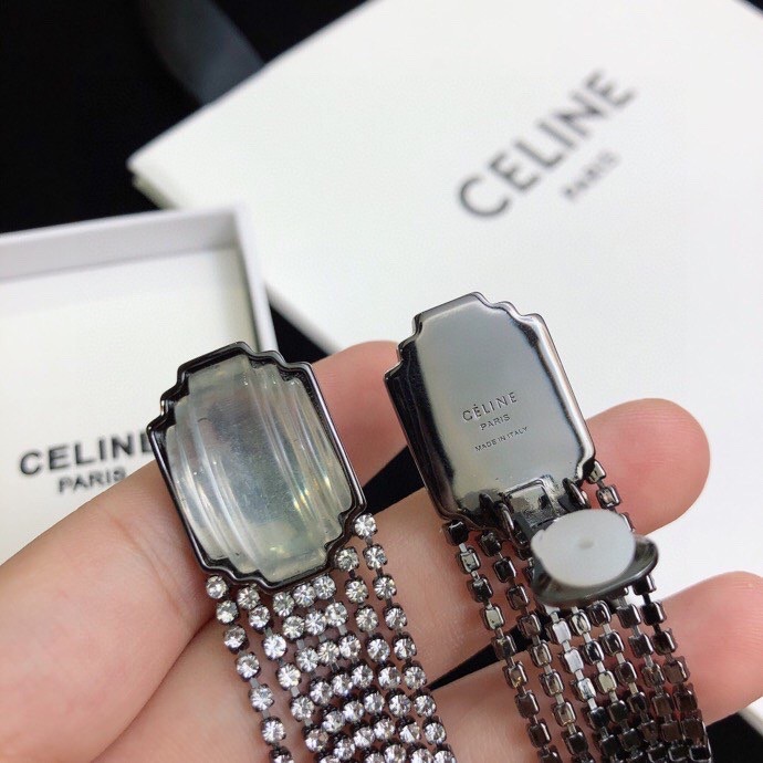 Celine Carved Stone Multi-Strand Crystal Tassel Earrings earrings Gunmetal-toned dark metal pale translucent carved stone clear faceted crystals 9cm length