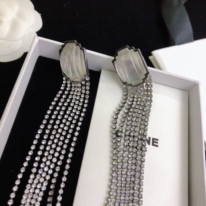 Celine Carved Stone Multi-Strand Crystal Tassel Earrings earrings Gunmetal-toned dark metal pale translucent carved stone clear faceted crystals 9cm length