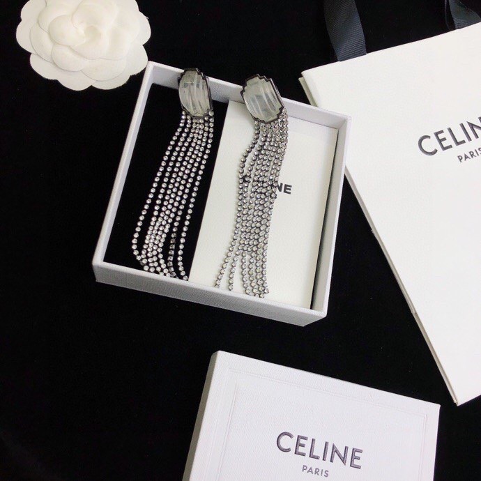Celine Carved Stone Multi-Strand Crystal Tassel Earrings earrings Gunmetal-toned dark metal pale translucent carved stone clear faceted crystals 9cm length