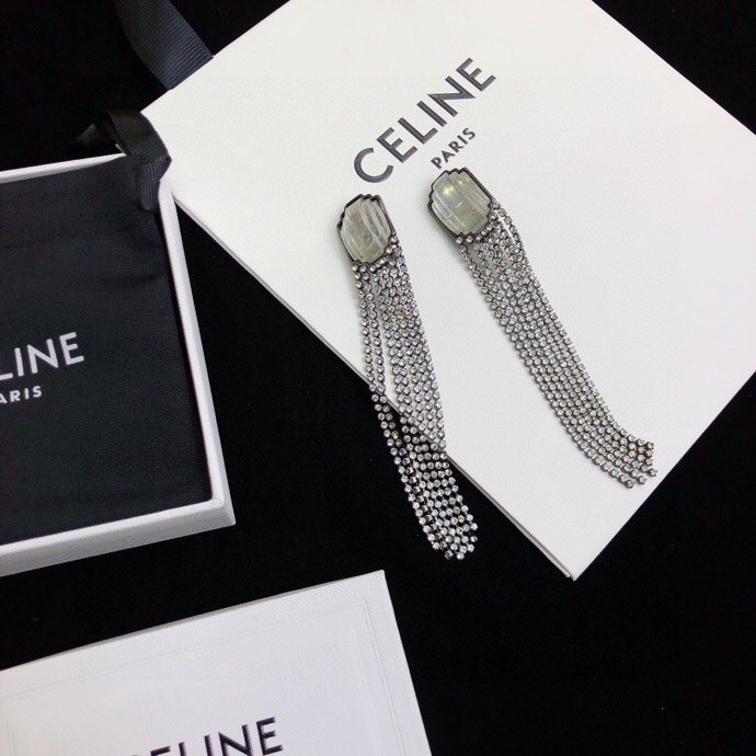 Celine Carved Stone Multi-Strand Crystal Tassel Earrings earrings Gunmetal-toned dark metal pale translucent carved stone clear faceted crystals 9cm length
