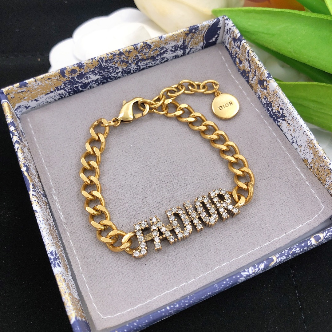 Dior J Adior bracelet gold-tone metal with clear crystal accents 18cm with 5cm extension chain