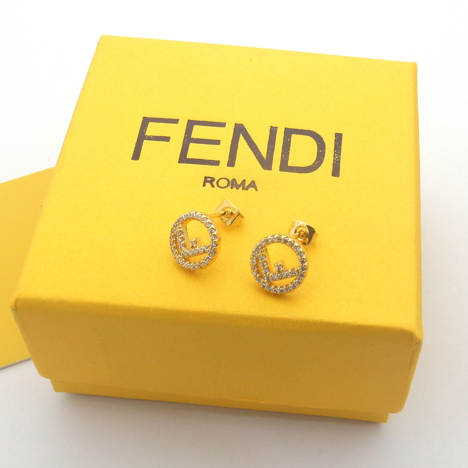 Fendi F is Fendi earrings gold-tone metal with clear crystals rose gold-tone metal with clear crystals silver-tone metal with clear crystals 1cm diameter