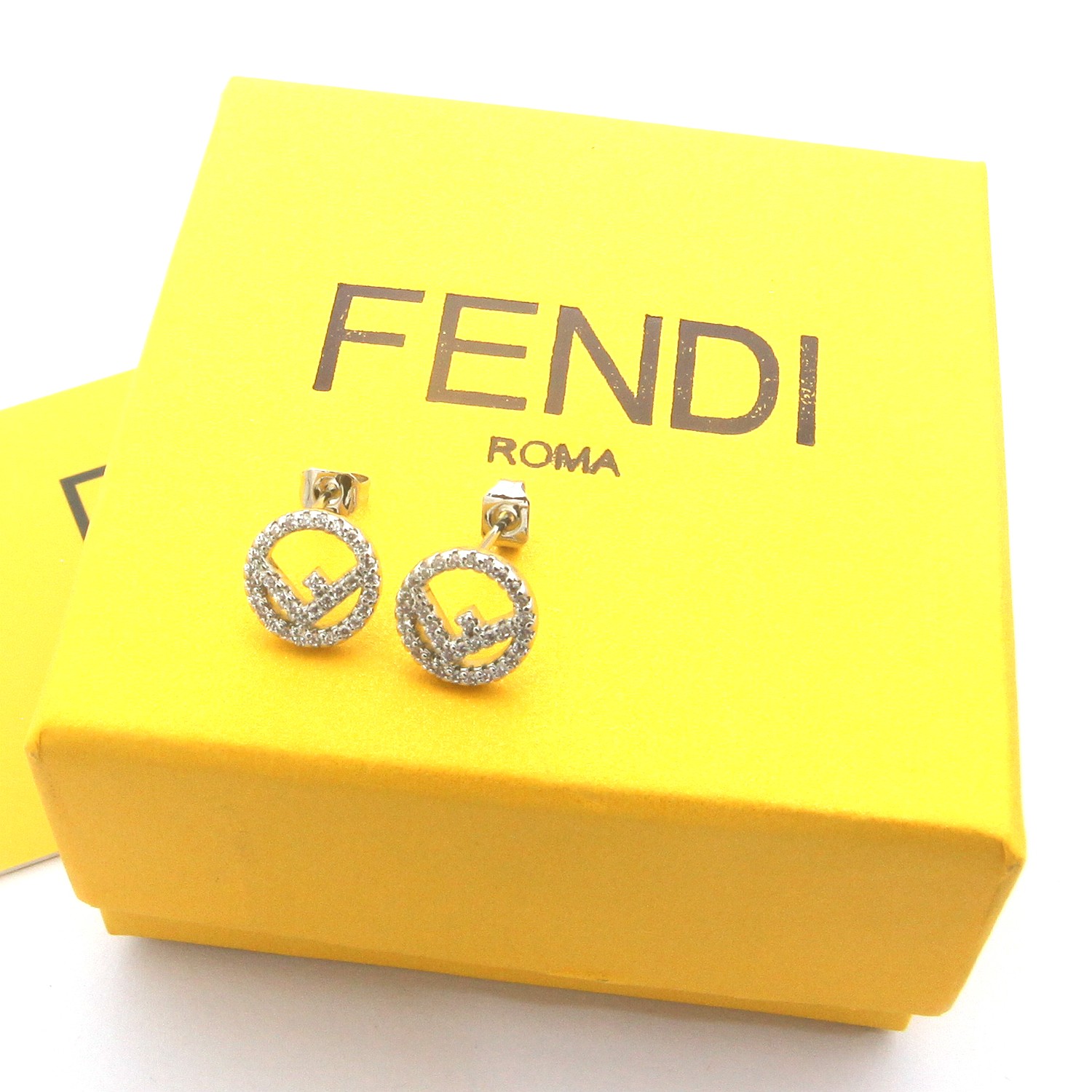 Fendi F is Fendi earrings gold-tone metal with clear crystals rose gold-tone metal with clear crystals silver-tone metal with clear crystals 1cm diameter