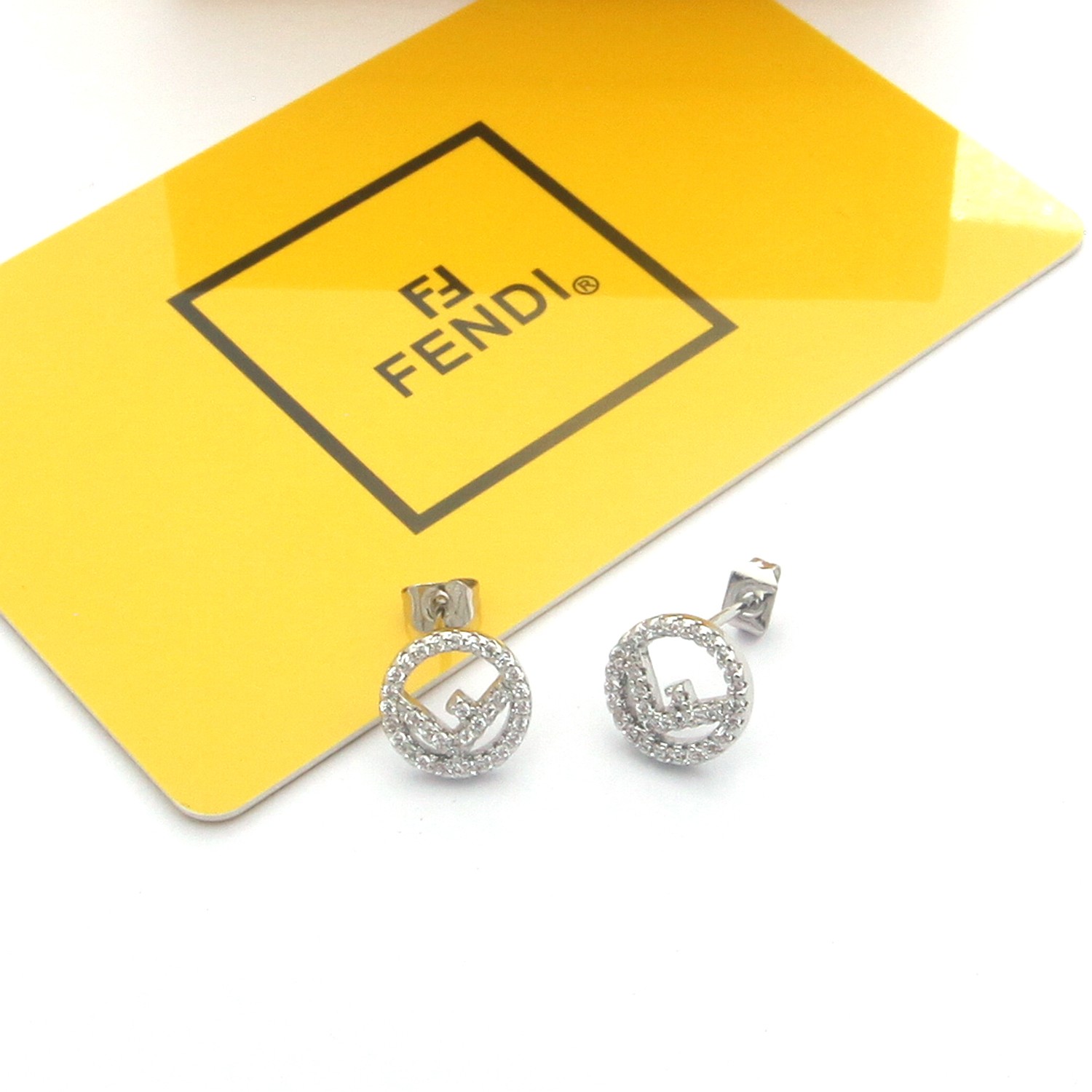 Fendi F is Fendi earrings gold-tone metal with clear crystals rose gold-tone metal with clear crystals silver-tone metal with clear crystals 1cm diameter
