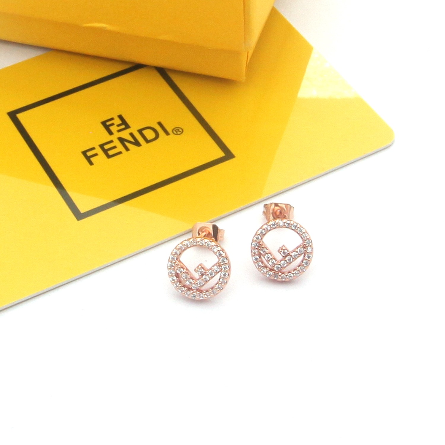 Fendi F is Fendi earrings gold-tone metal with clear crystals rose gold-tone metal with clear crystals silver-tone metal with clear crystals 1cm diameter