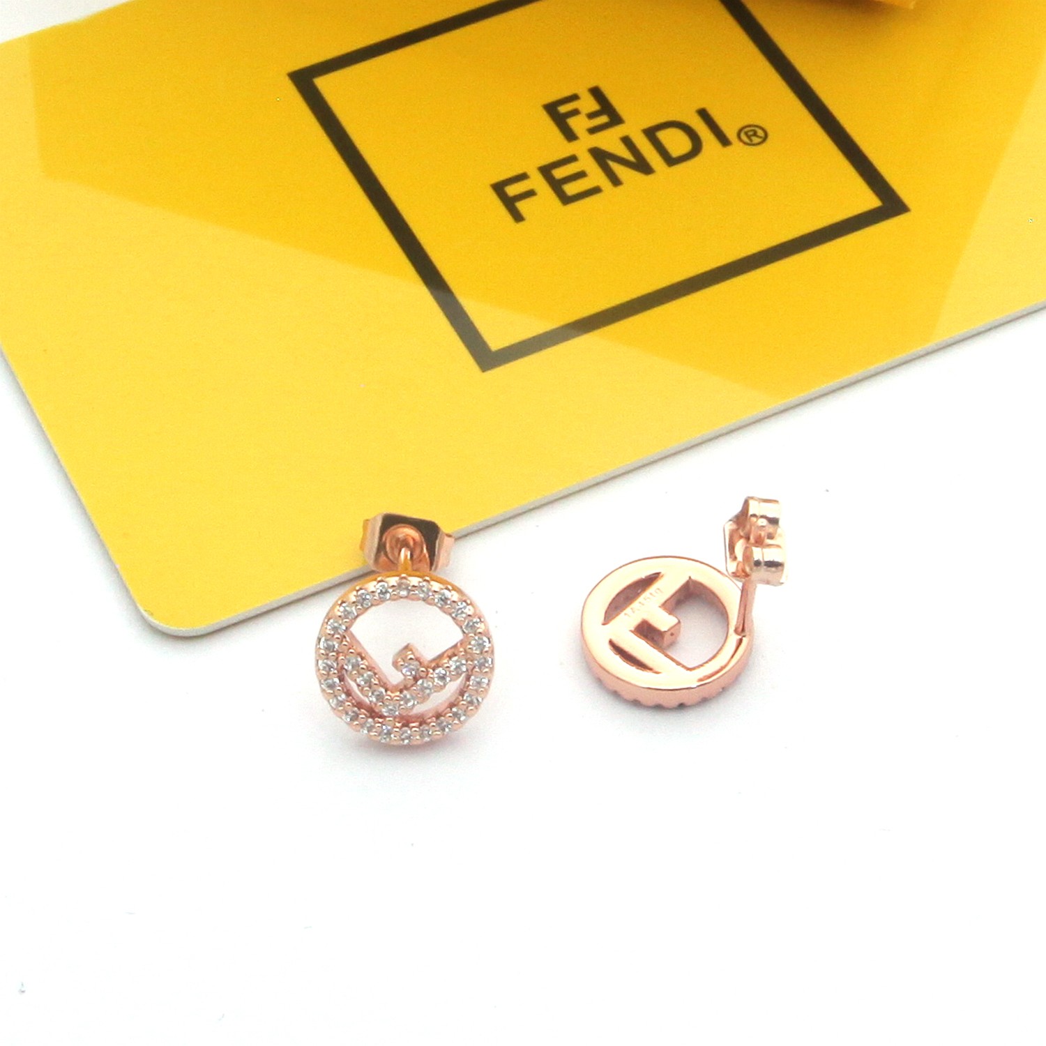 Fendi F is Fendi earrings gold-tone metal with clear crystals rose gold-tone metal with clear crystals silver-tone metal with clear crystals 1cm diameter