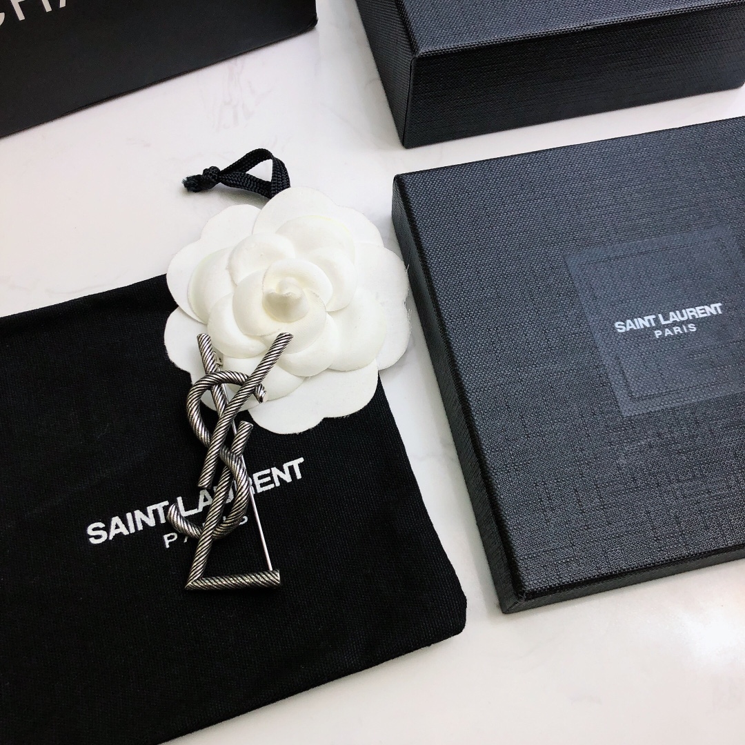 Saint Laurent Cassandre Twisted Monogram Brooch brooch antique silver-toned metal no gemstones 4 5cm