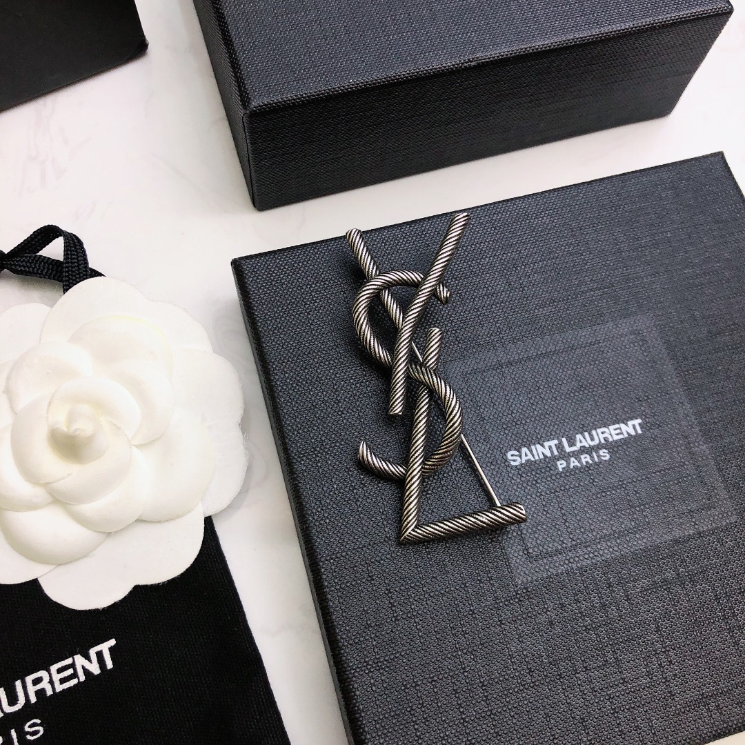 Saint Laurent Cassandre Twisted Monogram Brooch brooch antique silver-toned metal no gemstones 4 5cm