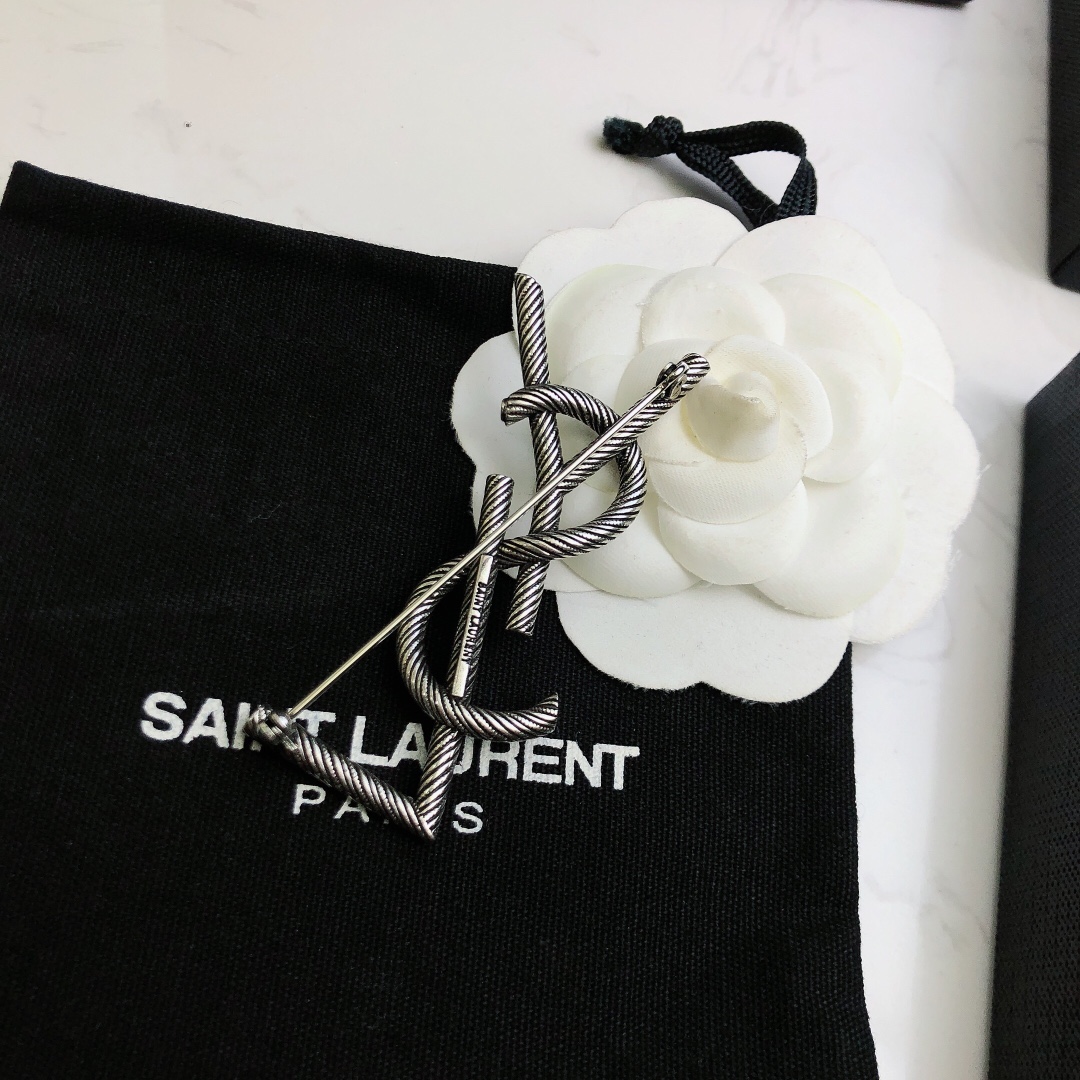 Saint Laurent Cassandre Twisted Monogram Brooch brooch antique silver-toned metal no gemstones 4 5cm