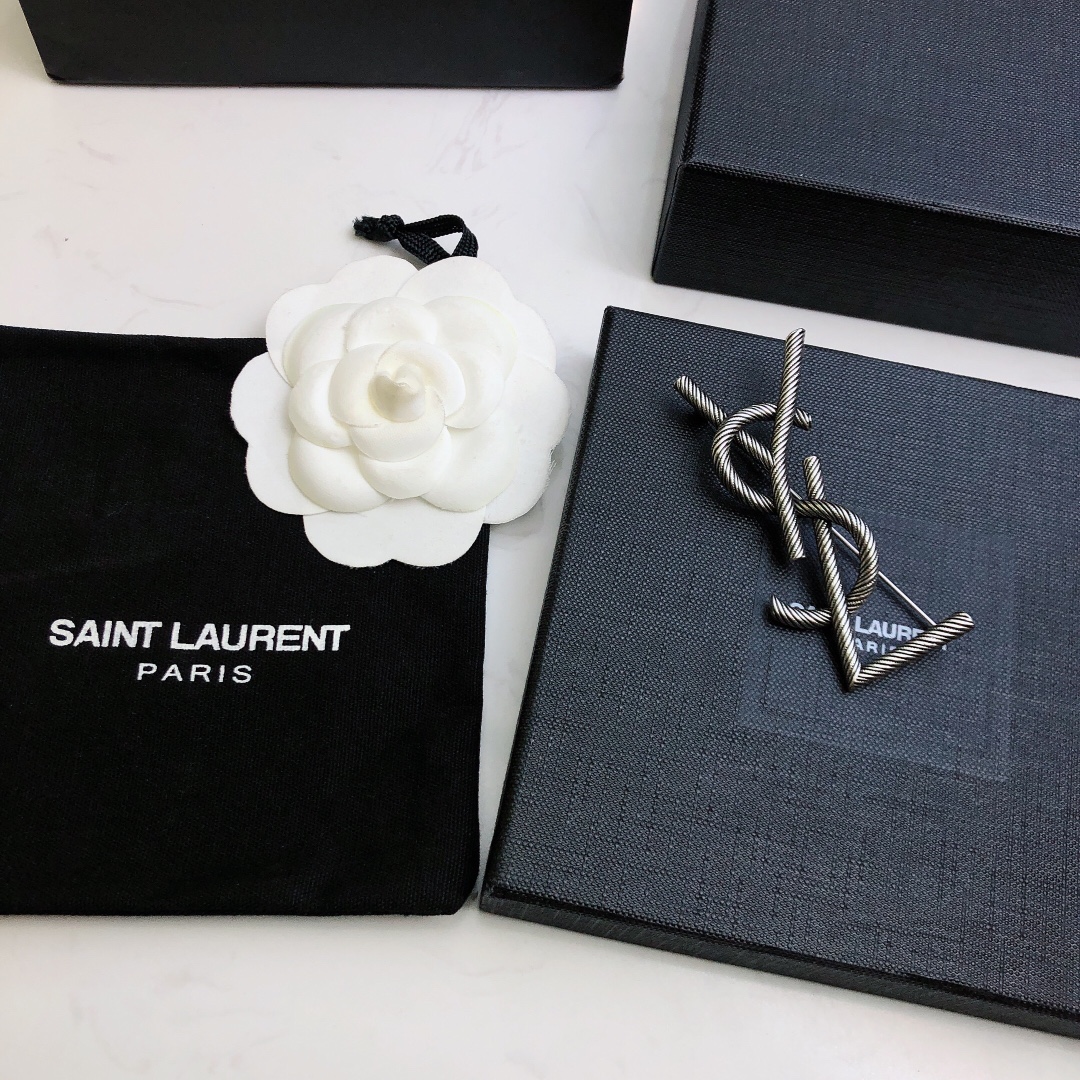 Saint Laurent Cassandre Twisted Monogram Brooch brooch antique silver-toned metal no gemstones 4 5cm