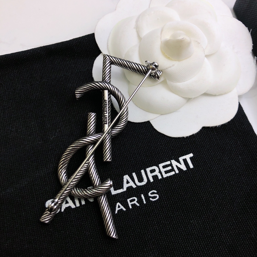 Saint Laurent Cassandre Twisted Monogram Brooch brooch antique silver-toned metal no gemstones 4 5cm
