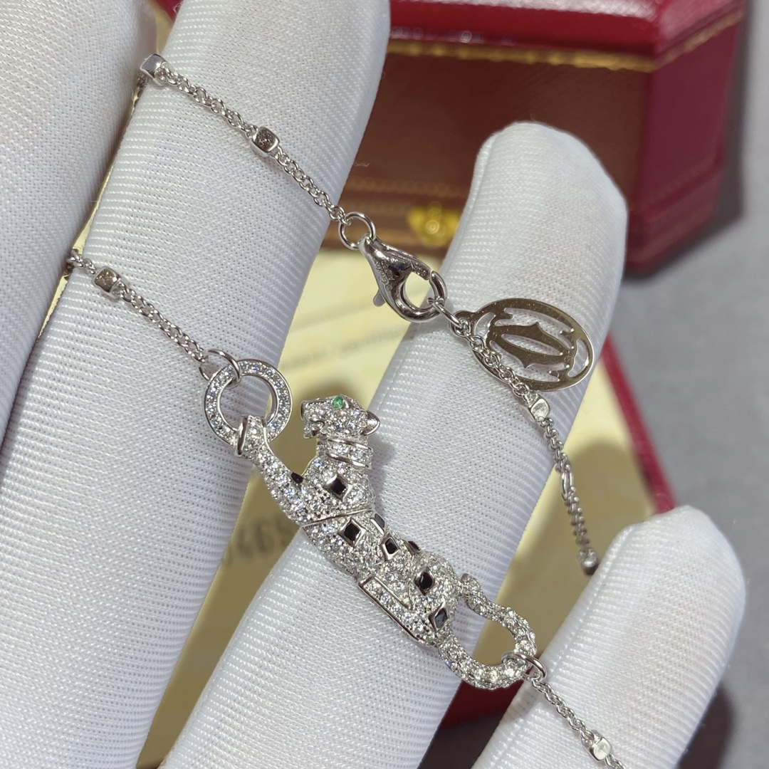 Cartier Panthere de Cartier necklace 18k white gold set with white diamonds black onyx spots green tsavorite garnet eye 42cm