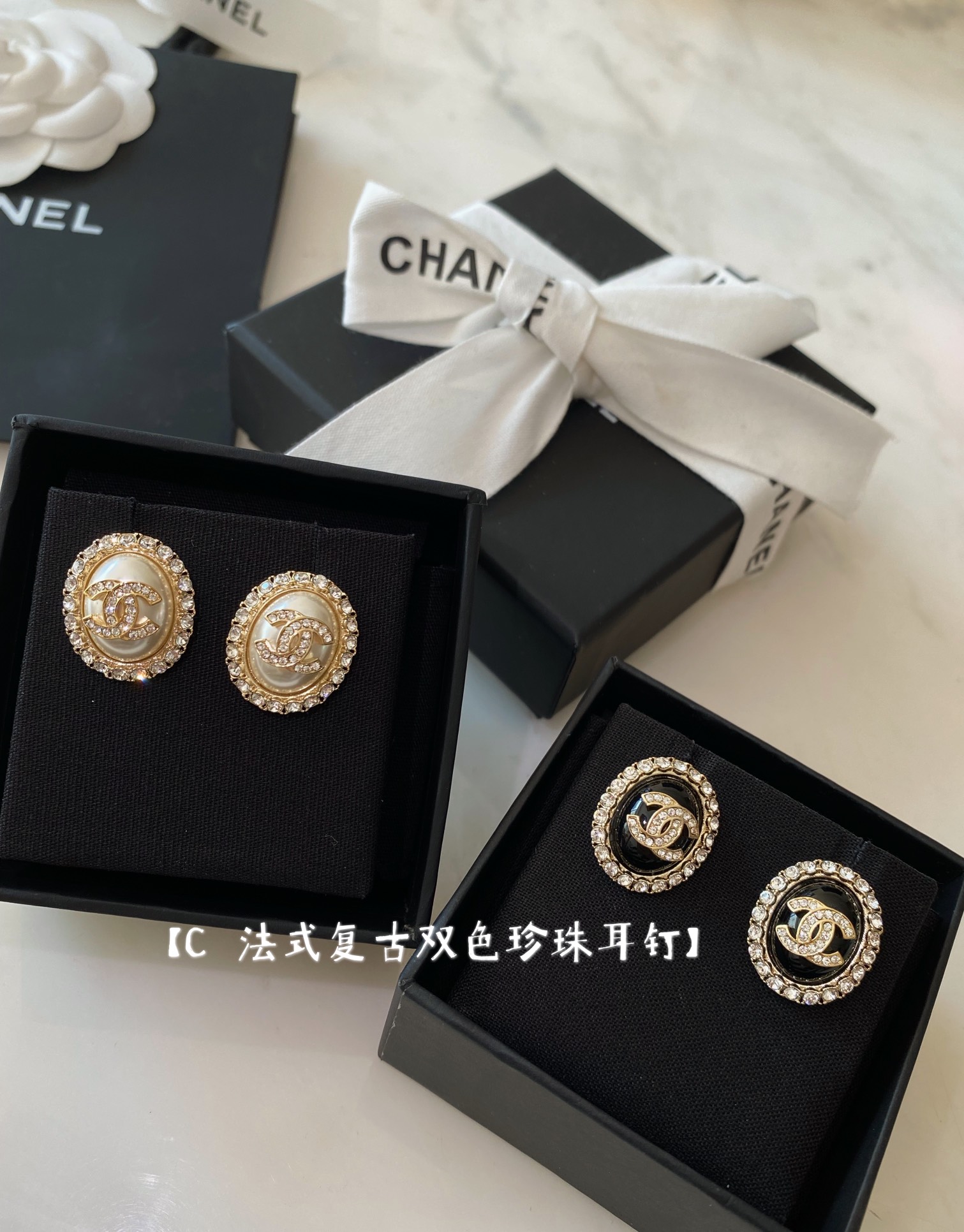 Chanel earrings Gold-tone metal with clear crystals available in cream pearl and black resin center options 1 5cm diameter
