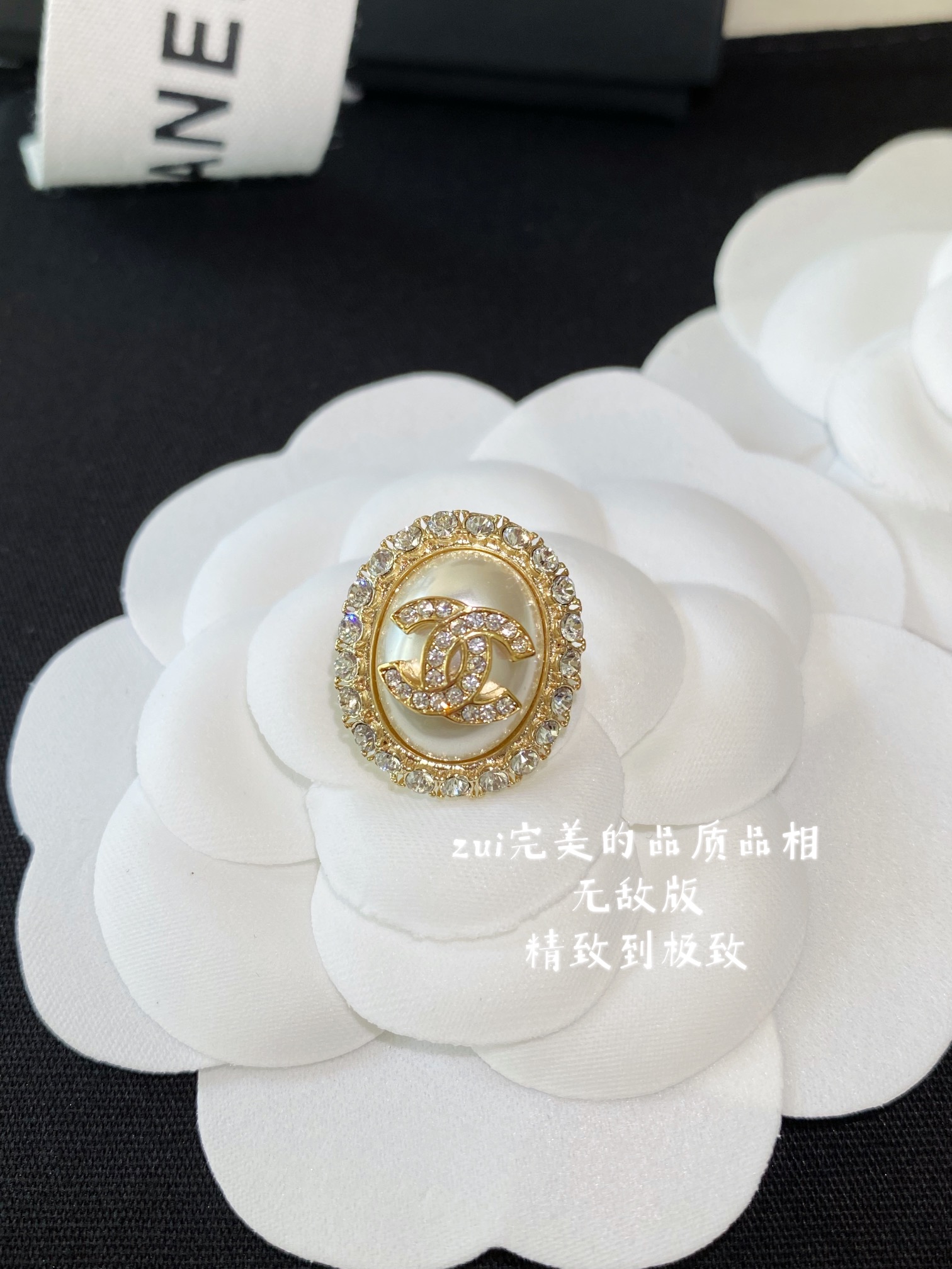 Chanel earrings Gold-tone metal with clear crystals available in cream pearl and black resin center options 1 5cm diameter