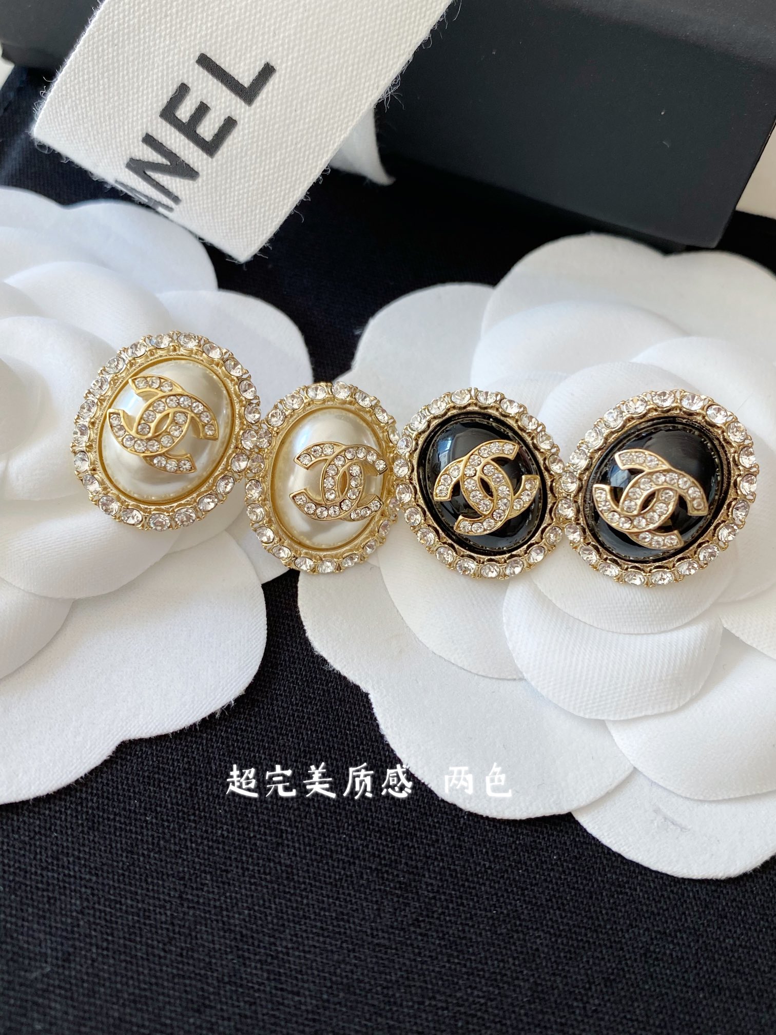 Chanel earrings Gold-tone metal with clear crystals available in cream pearl and black resin center options 1 5cm diameter