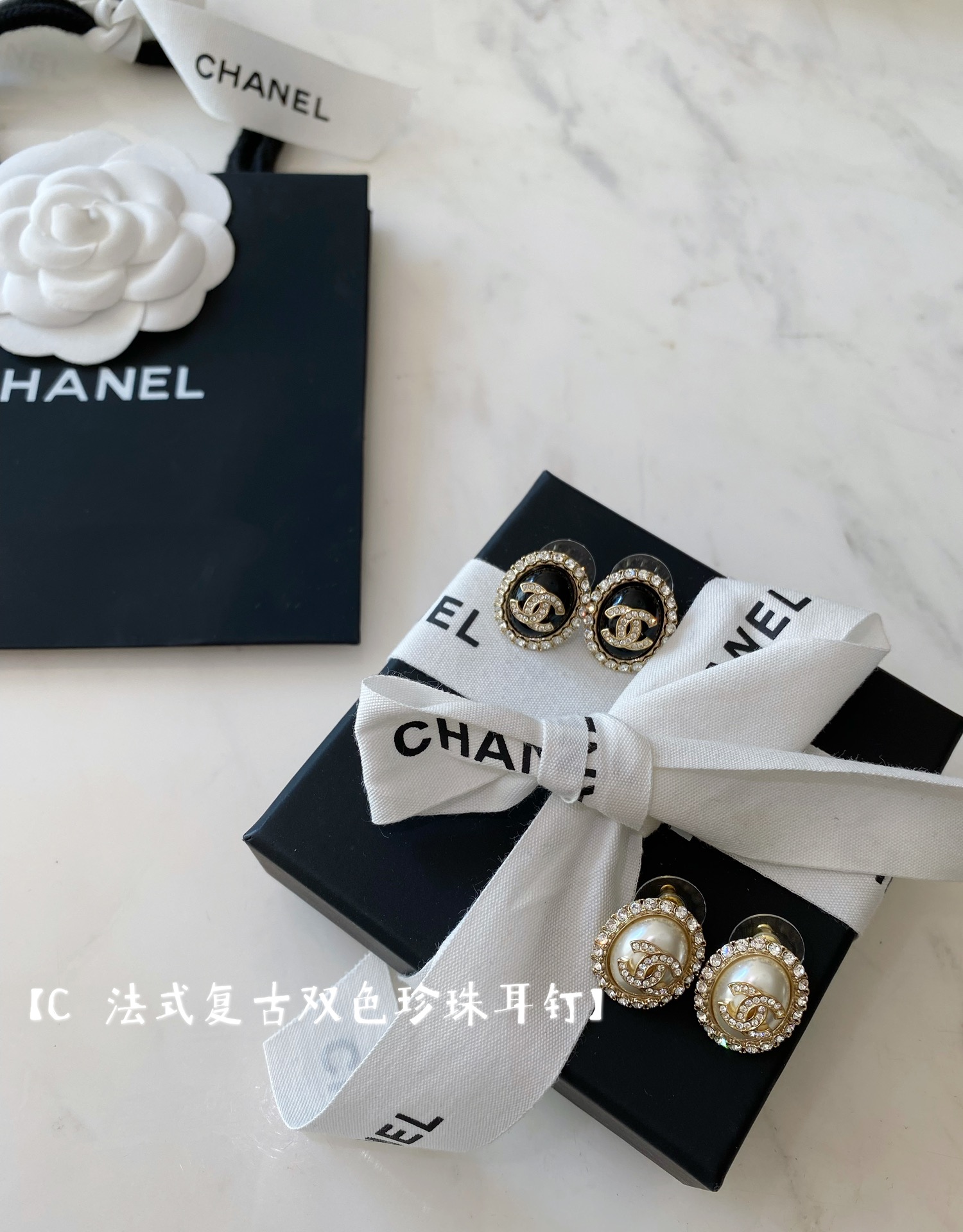 Chanel earrings Gold-tone metal with clear crystals available in cream pearl and black resin center options 1 5cm diameter