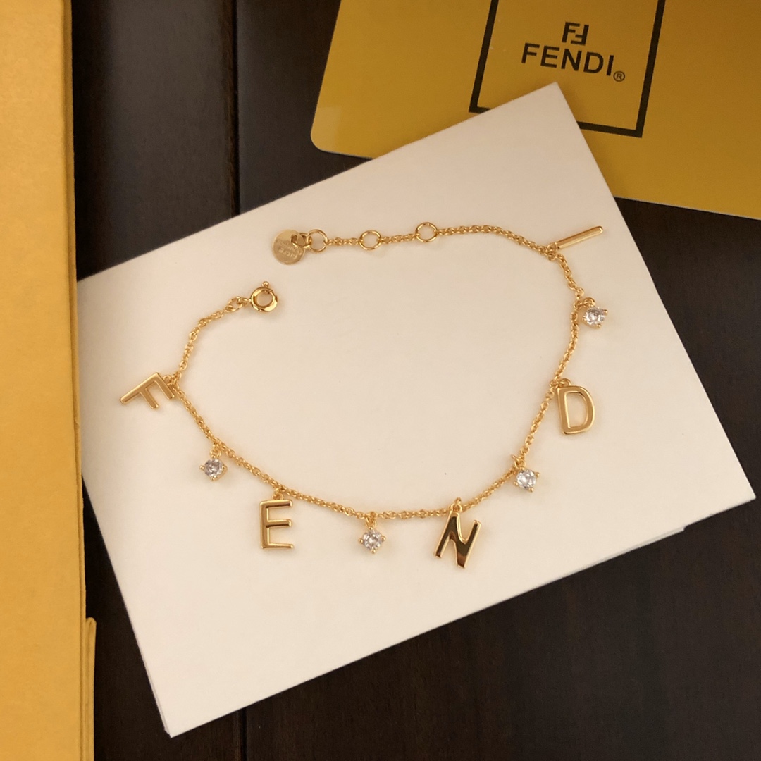Fendi FENDI Letter Charm Bracelet bracelet gold-tone metal with clear cubic zirconia stones 18cm