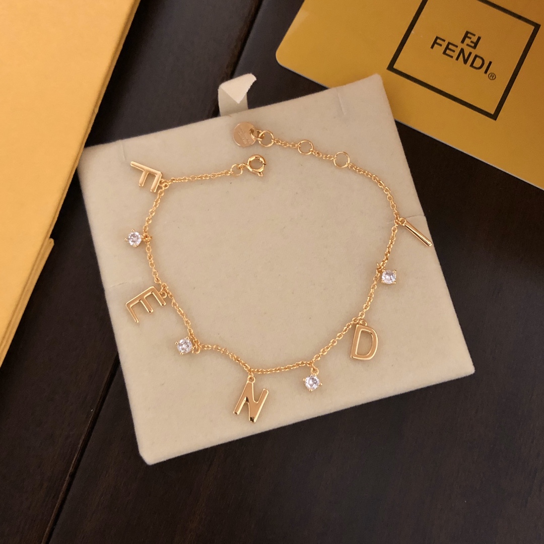 Fendi FENDI Letter Charm Bracelet bracelet gold-tone metal with clear cubic zirconia stones 18cm