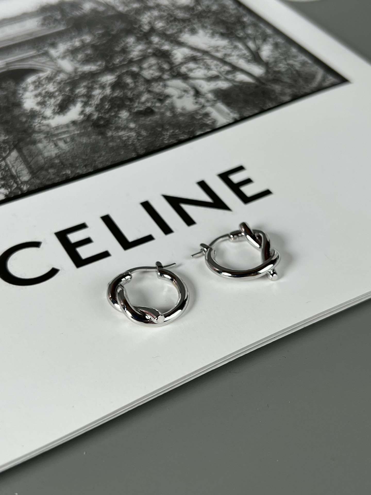 Celine Knot Small Hoop Earrings earrings silver-toned metal no accent stones 1 5cm diameter
