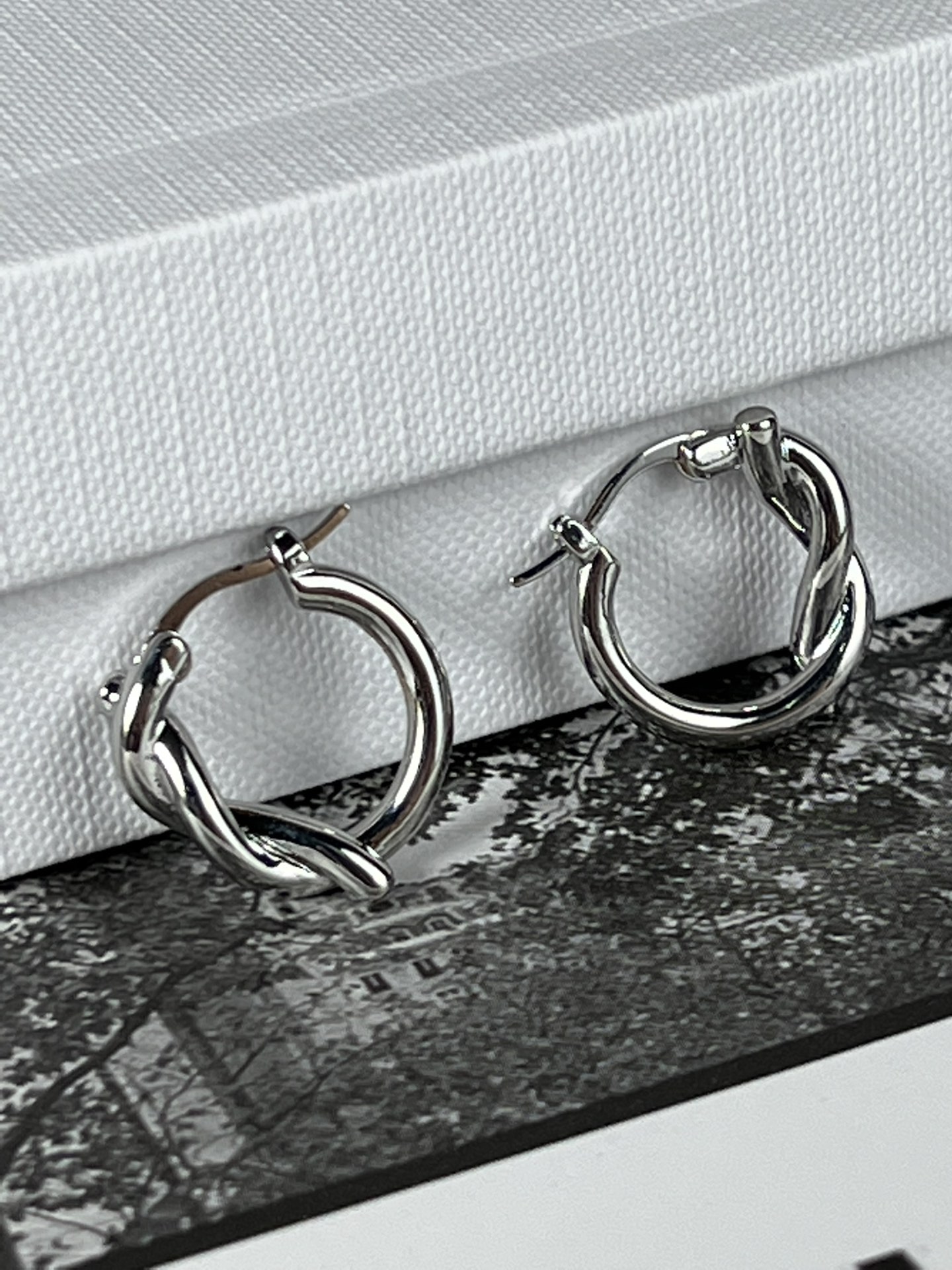 Celine Knot Small Hoop Earrings earrings silver-toned metal no accent stones 1 5cm diameter