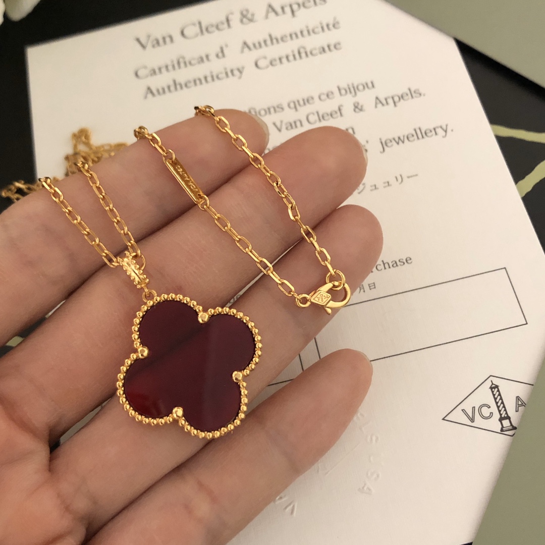 Van Cleef Arpels Magic Alhambra necklace 18k yellow gold with carnelian and malachite clover motifs 25mm pendant