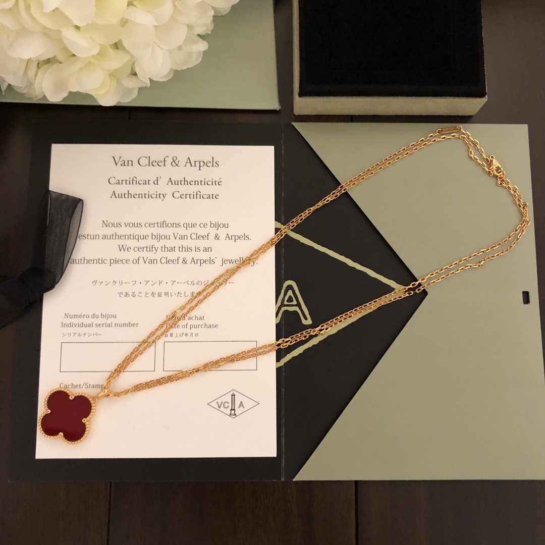 Van Cleef Arpels Magic Alhambra necklace 18k yellow gold with carnelian and malachite clover motifs 25mm pendant