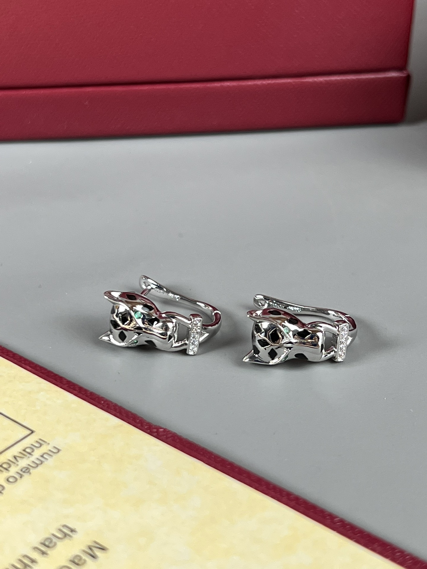 Cartier Panthere de Cartier earrings silver-toned white gold black lacquer clear diamonds green tsavorite garnet 12mm length