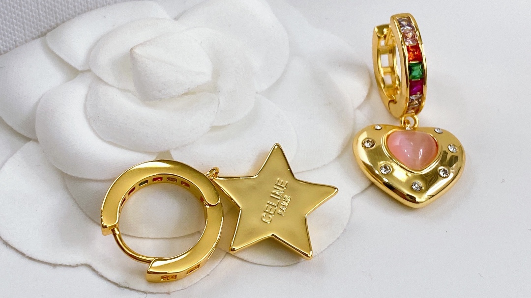 Celine Asymmetric Heart Star Rainbow Crystal Huggie Earrings earrings Gold-tone metal with multicolor rainbow crystals pink opal-style heart stone blue crystal star and clear accent crystals 12mm hoop diameter 20mm total drop length