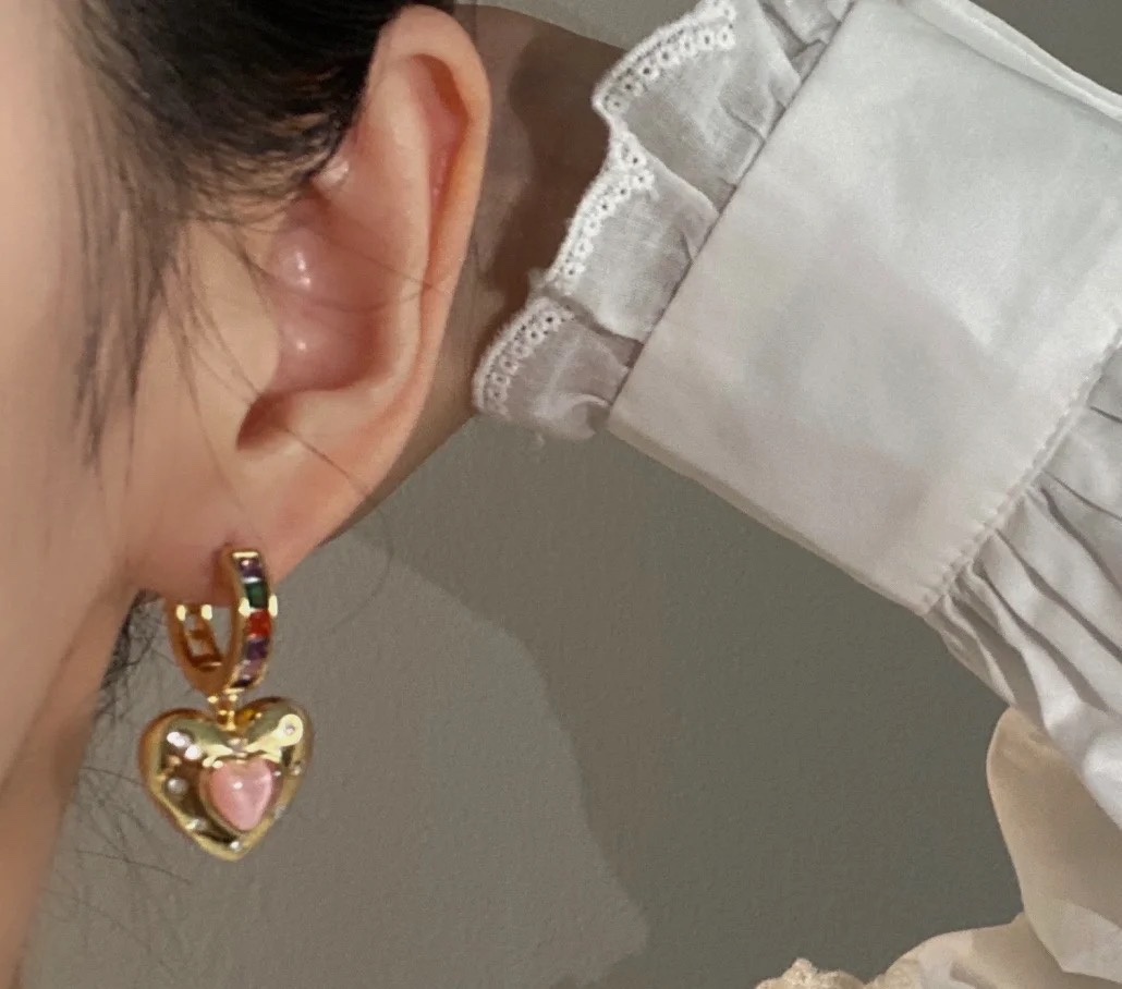 Celine Asymmetric Heart Star Rainbow Crystal Huggie Earrings earrings Gold-tone metal with multicolor rainbow crystals pink opal-style heart stone blue crystal star and clear accent crystals 12mm hoop diameter 20mm total drop length