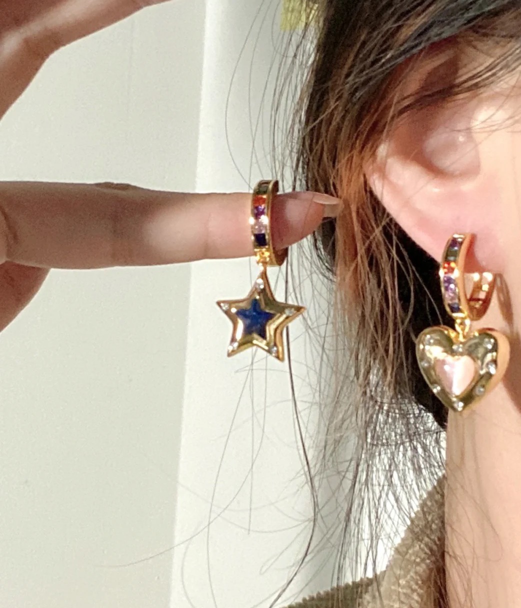 Celine 090045 Heart Star Charm Hoop Earrings earrings gold-tone metal with multicolor rainbow gemstones on hoops pink opal-like heart center blue lapis-like star center clear accent stones 1 5cm hoop diameter 2 5cm total drop length