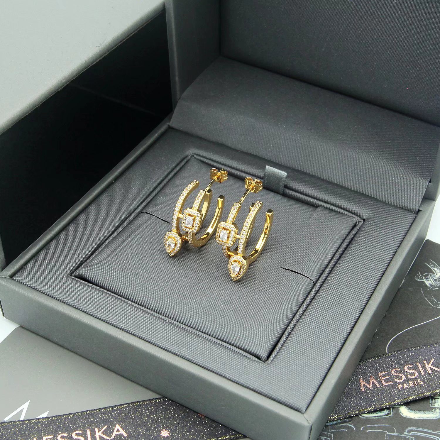 Messika Move Series earrings 18k white gold with clear diamonds 18k yellow gold with clear diamonds 1 5cm hoop diameter