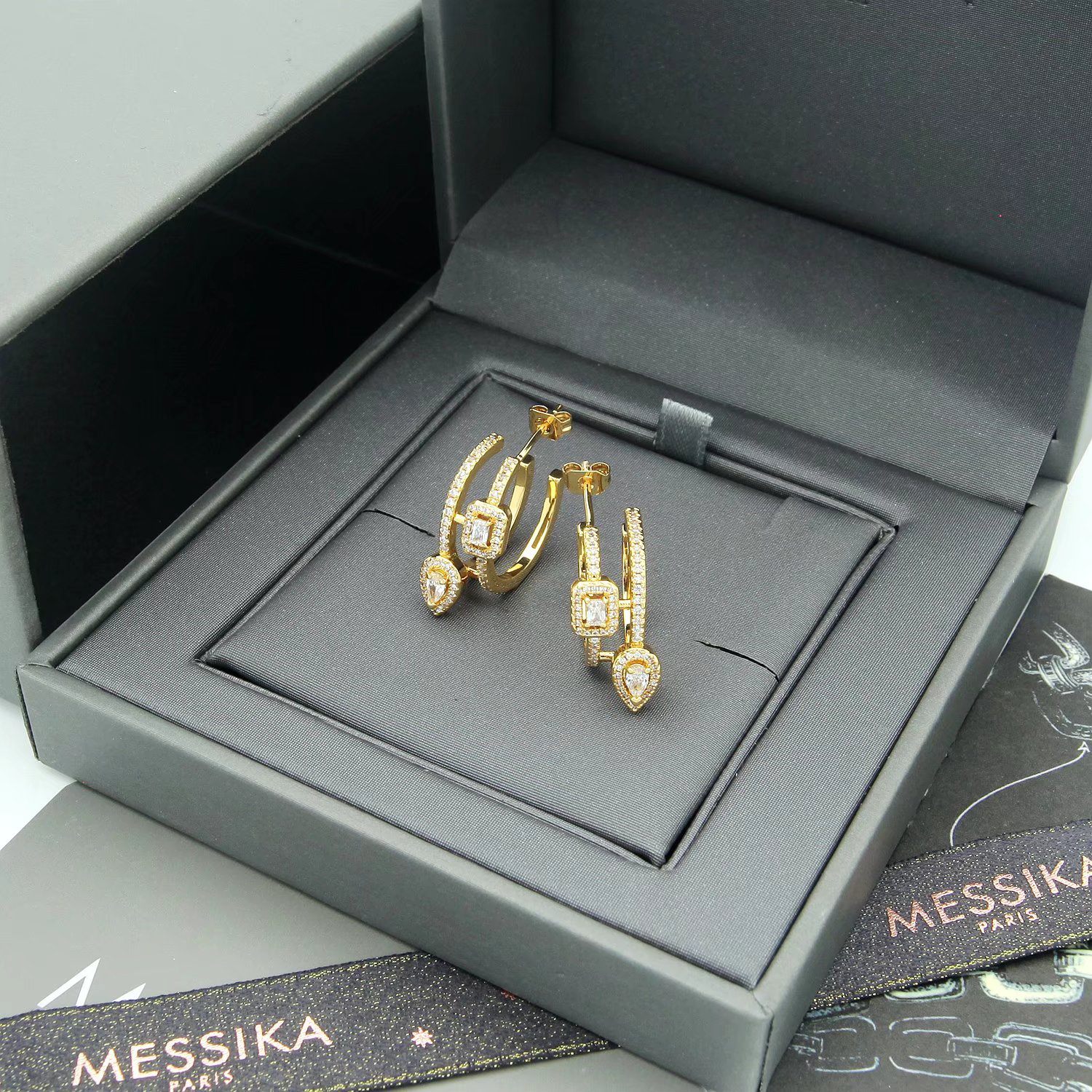 Messika Move Series earrings 18k white gold with clear diamonds 18k yellow gold with clear diamonds 1 5cm hoop diameter