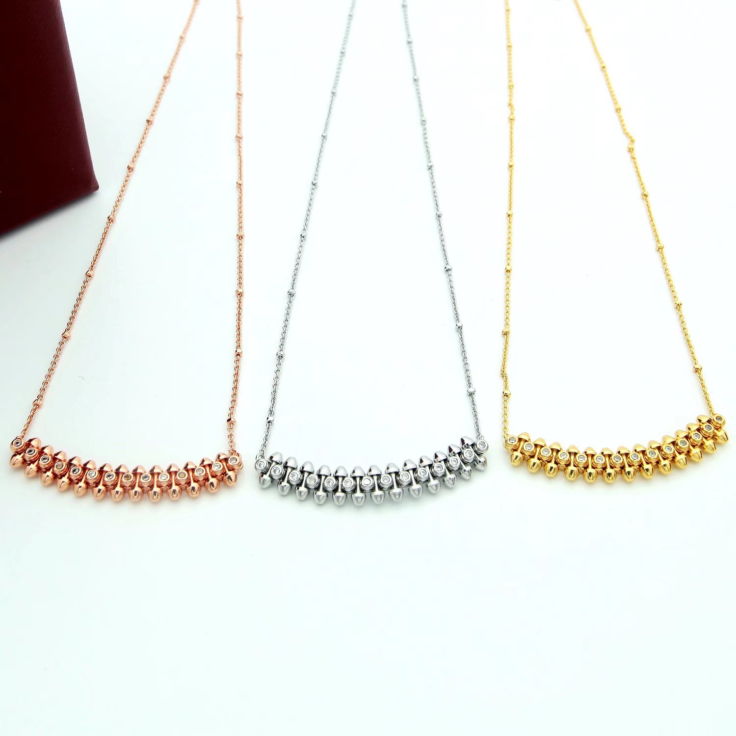 Cartier Clash de Cartier necklace Yellow gold with clear diamond accents available in 18k yellow gold 18k white gold and 18k rose gold variants with clear diamond accents 42cm
