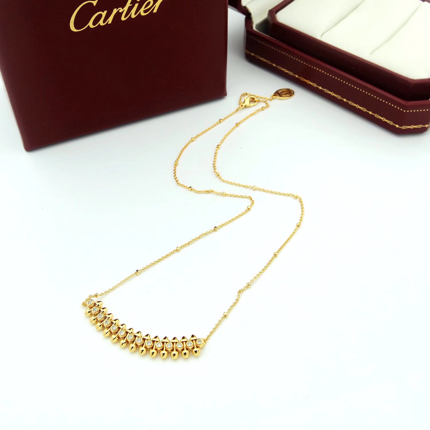 Cartier Clash de Cartier necklace Yellow gold with clear diamond accents available in 18k yellow gold 18k white gold and 18k rose gold variants with clear diamond accents 42cm