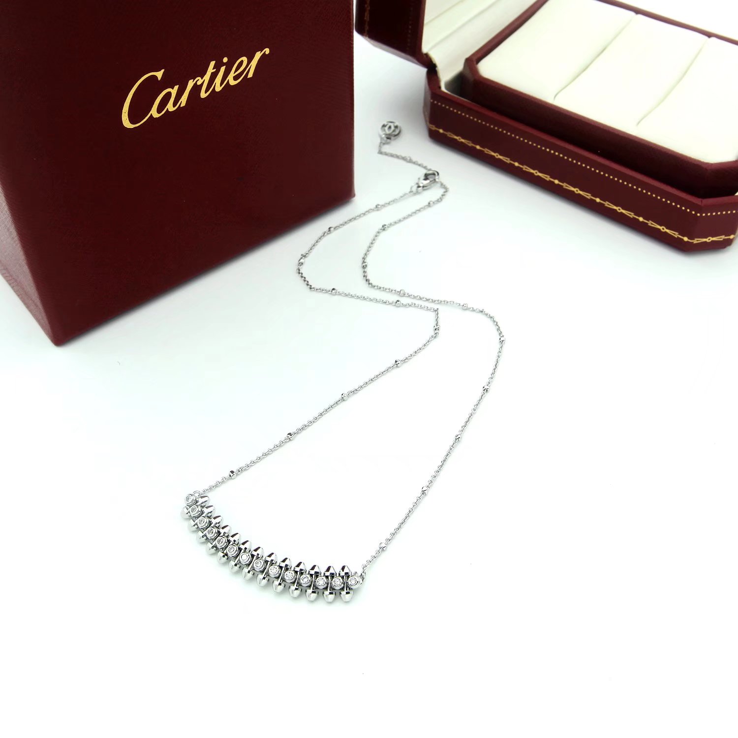 Cartier Clash de Cartier necklace Yellow gold with clear diamond accents available in 18k yellow gold 18k white gold and 18k rose gold variants with clear diamond accents 42cm