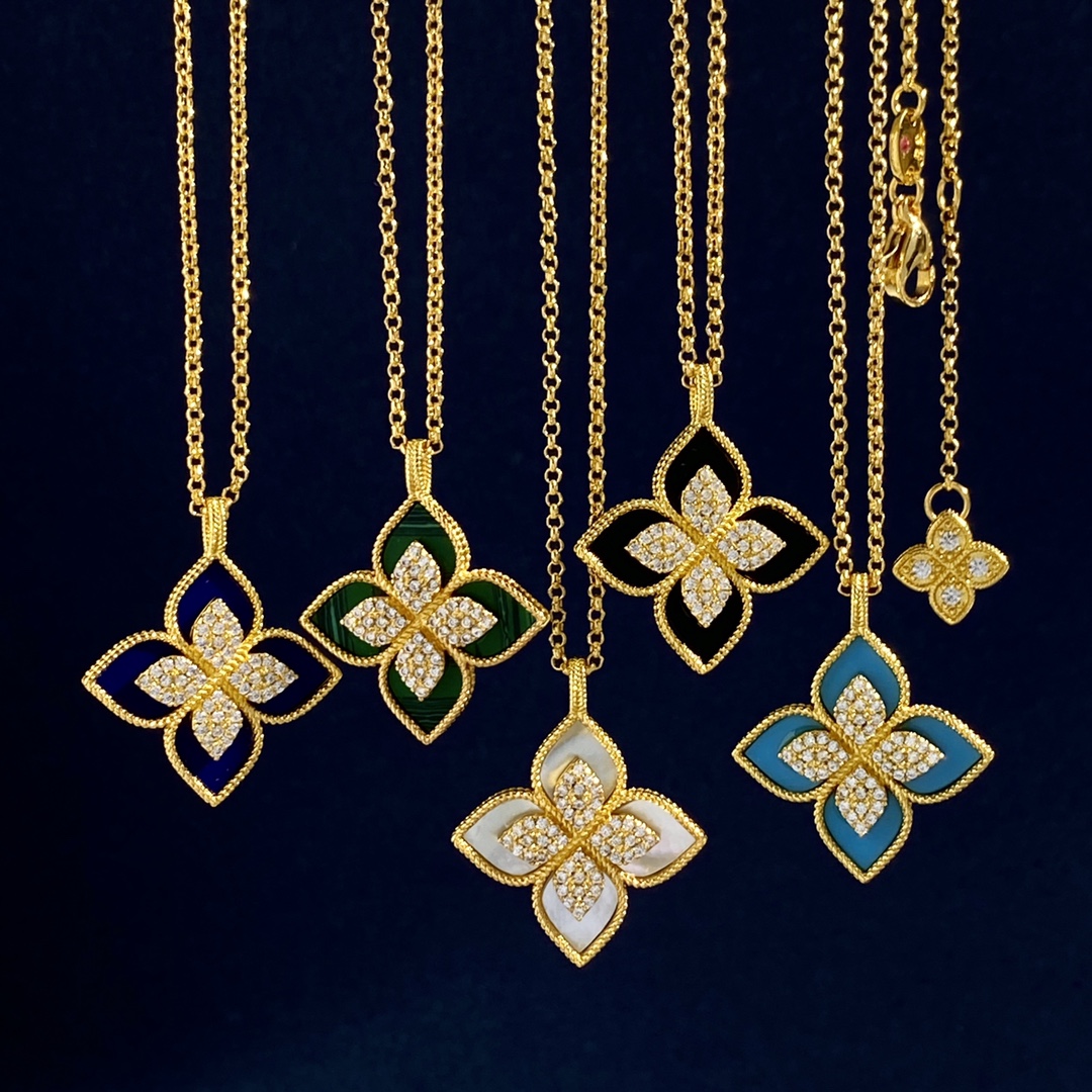 Roberto Coin Princess Flower necklace Yellow gold with white diamond accents available in mother-of-pearl and malachite stone variants 18 inches